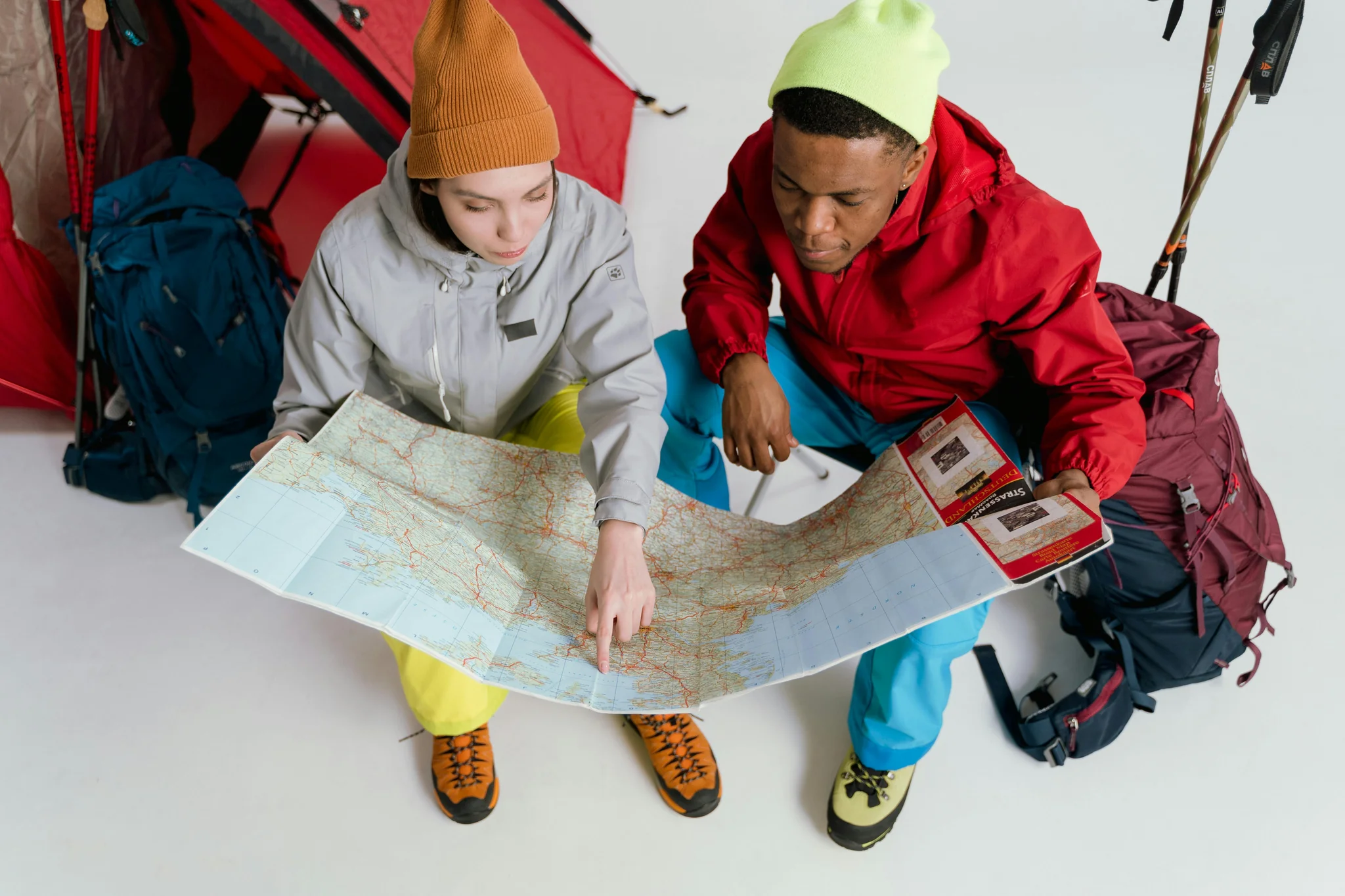Travel blogger working on laptop with scenic view